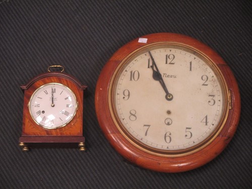 Lot 17 - A modern mantle clock by Comitti in mahogany...