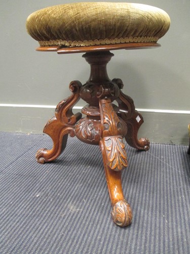 Lot 616 - Two Victorian piano stools with swivel tops on...