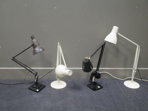 Lot 581 - An anglepoise type lamp on caster base, two...
