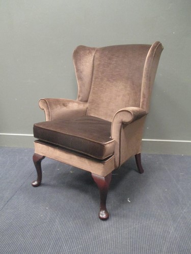 Lot 543 - A modern Parker Knoll wing armchair