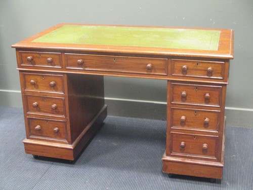 Lot 606 - A late Victorian mahogany twin pedestal desk,...
