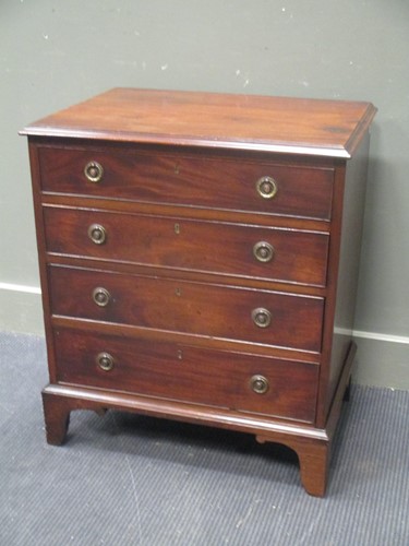 Lot 598 - A 19th century mahogany four drawer chest of...