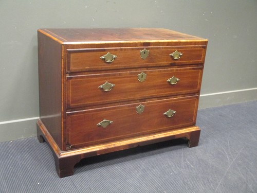 Lot 474 - An 18th century cross banded red walnut caddy...