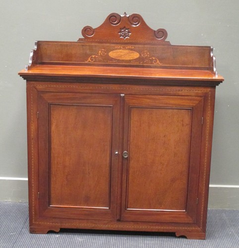 Lot 621 - A two door chiffonier with inlaid, carved...