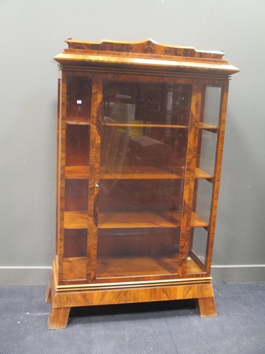 Lot 509 - A Biedermeier style walnut display cabinet...