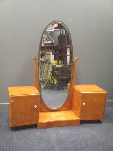 Lot 450 - An Art Deco burr walnut pedestal dressing...
