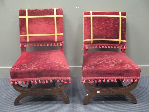 Lot 493 - A near pair of low easy chairs upholstered in...