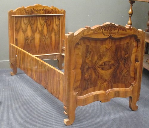 Lot 522 - An early 20th century continental walnut...