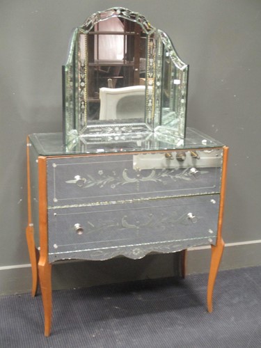 Lot 451 - A mirror clad chest of two drawers, 80cm and a...