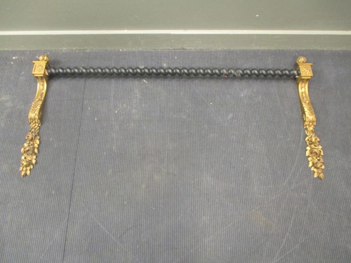 Lot 495 - A pair of giltwood carved curtian pole...