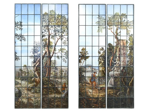Lot 416 - A pair of pastoral scenes in stained glass