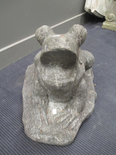 Lot 434 - A carved granite figure of a frog, 49cm high,...