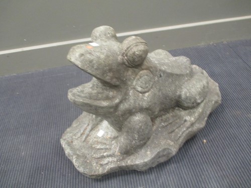 Lot 434 - A carved granite figure of a frog, 49cm high,...