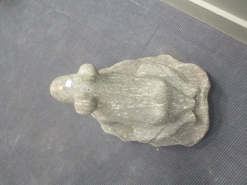 Lot 434 - A carved granite figure of a frog, 49cm high,...