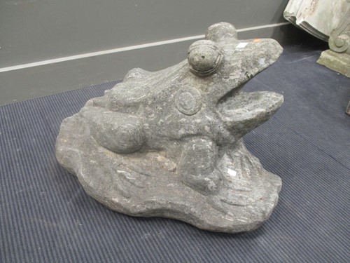Lot 434 - A carved granite figure of a frog, 49cm high,...