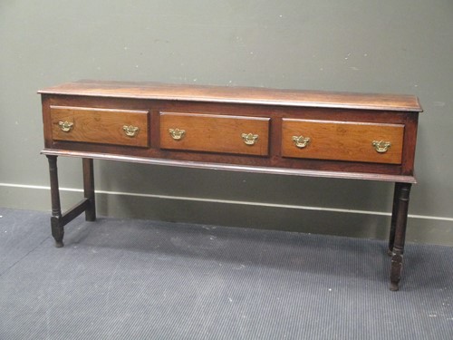 Lot 608 - A 19th century oak dresser base with three...