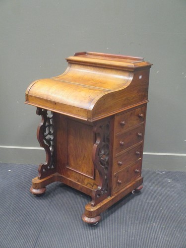 Lot 618 - A mid Victorian walnut piano top Davenport, 94...