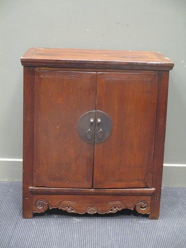Lot 485 - A 20th century Chinese hardwood two door...