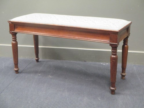 Lot 487 - A mahogany rectangular long stool/ window seat...