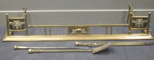 Lot 578 - A brass fender in the Art Nouveau taste,...