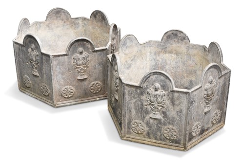 Lot 475 - A pair of octagonal lead planters, 20th century