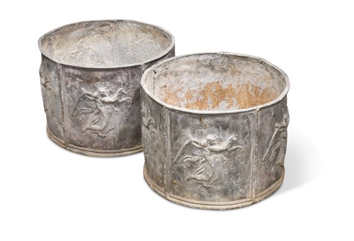 Lot 476 - A pair of circular lead planters, 20th century