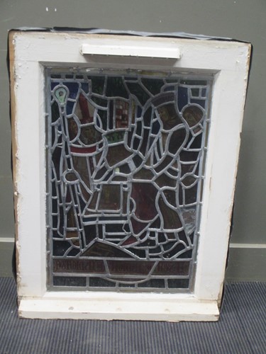Lot 151 - A leaded stained glass panel of a medieval...