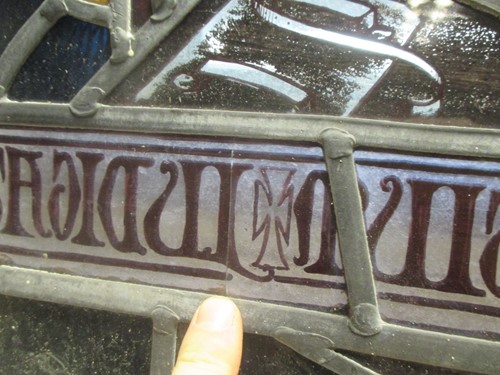 Lot 151 - A leaded stained glass panel of a medieval...