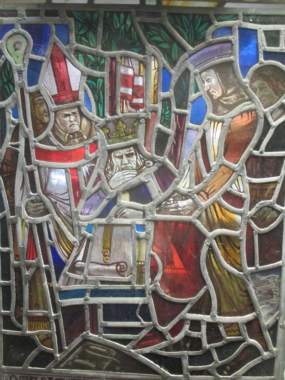 Lot 151 - A leaded stained glass panel of a medieval...