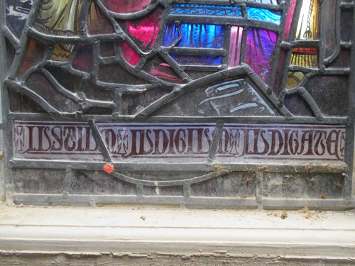 Lot 151 - A leaded stained glass panel of a medieval...