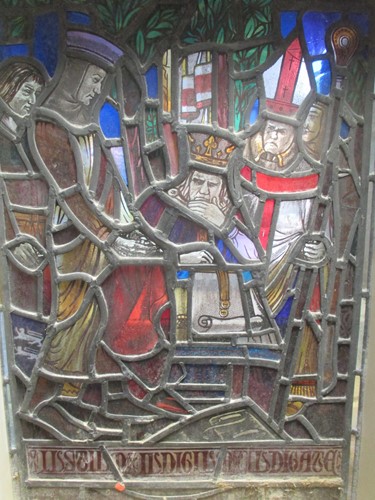 Lot 151 - A leaded stained glass panel of a medieval...
