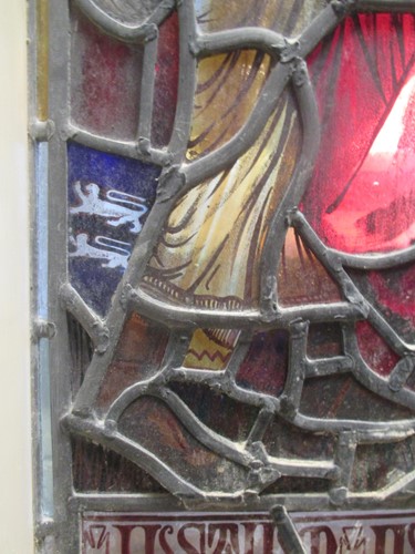 Lot 151 - A leaded stained glass panel of a medieval...