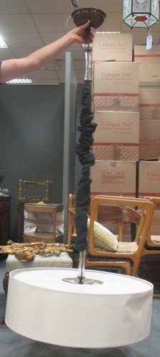 Lot 425 - A modern five light ceiling light with bronzed...