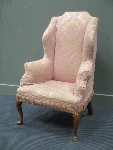 Lot 422 - An early 18th century style walnut frame wing...