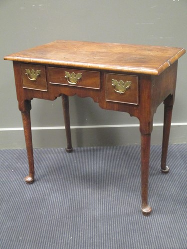 Lot 491 - Walnut lowboy fitted with three drawers, 70 x...