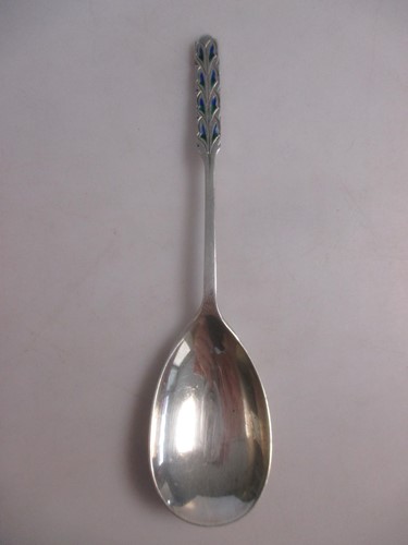 Lot 166 - Liberty - A silver and enamel preserve spoon,...