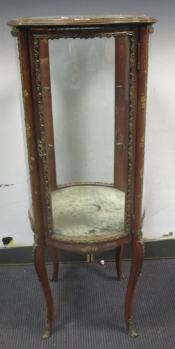 Lot 502 - A Louis XV style gilt metal mounted circular...