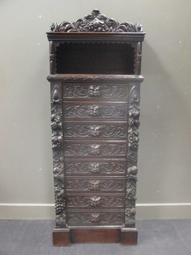 Lot 521 - An early 20th century carved oak Wellington...