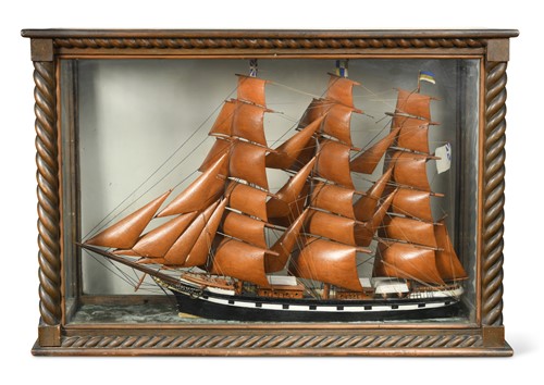 Lot 382 - A model of a three-masted clipper within a rope-twist case, 19th century