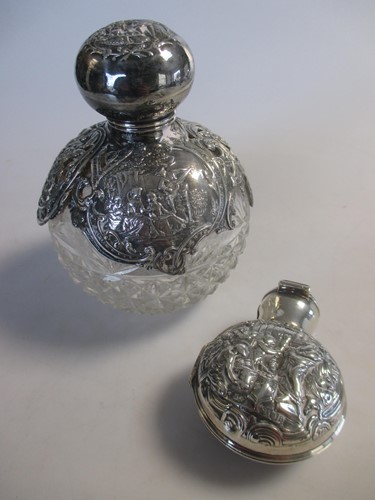 Lot 181 - Two Victorian silver perfume bottles, one a...