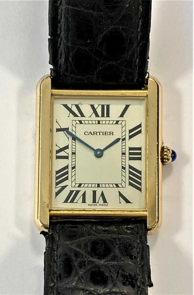 Lot 235 - Cartier - A Swiss 18ct gold and stainless steel 'Tank Solo' wristwatch