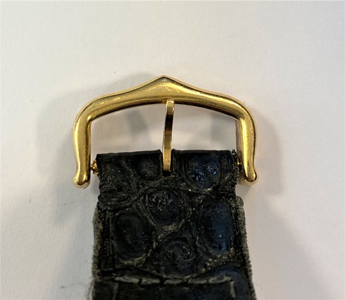 Lot 235 - Cartier - A Swiss 18ct gold and stainless steel 'Tank Solo' wristwatch
