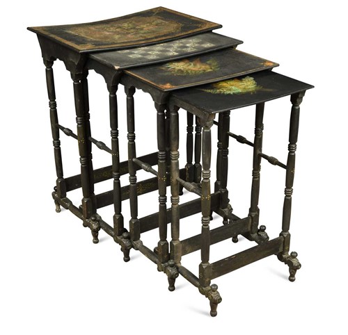 Lot 562 - A nest of four black and gilt lacquer occasional tables