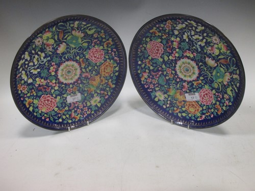 Lot 17 - A pair of Cloisonné plates, the blue ground...