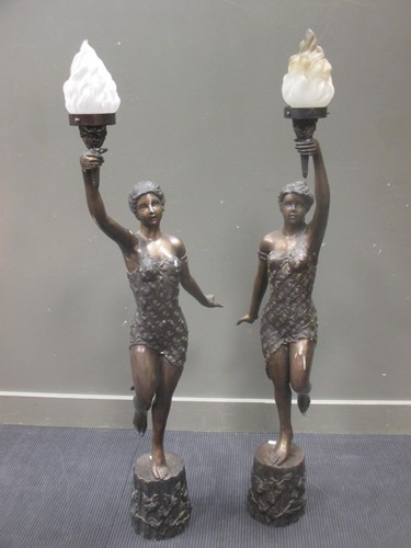 Lot 576 - A pair of 20th century bronze lamps in the...