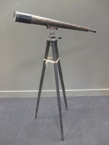 Lot 124 - A military brass telescope on stand, stamped...