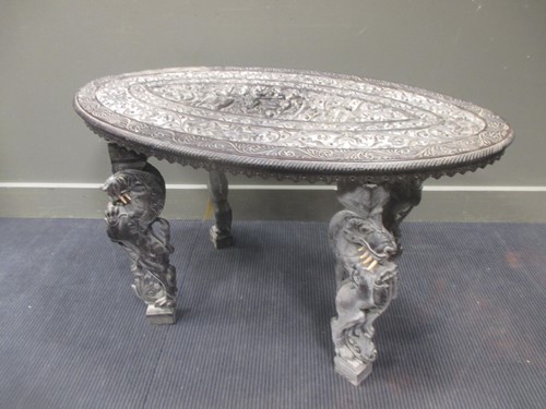Lot 502 - An early 20th century carved Indian carved...