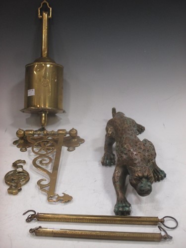 Lot 57 - A Victorian brass spit jack, a brass leopard...
