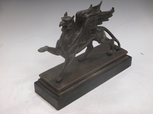 Lot 46 - A bronze Griffin, 20 x 31cm