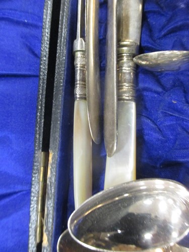 Lot 200 - A silver plated tantalus together with a...
